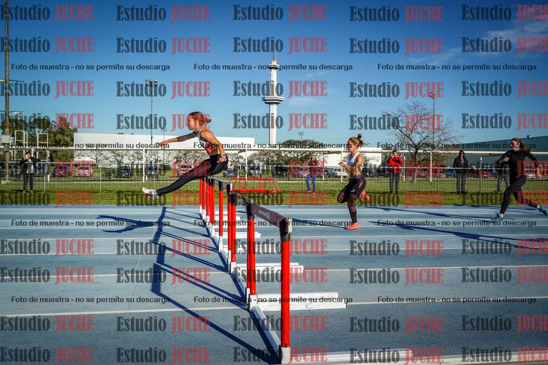 Fotos de los 100 m con vallas de mujeres