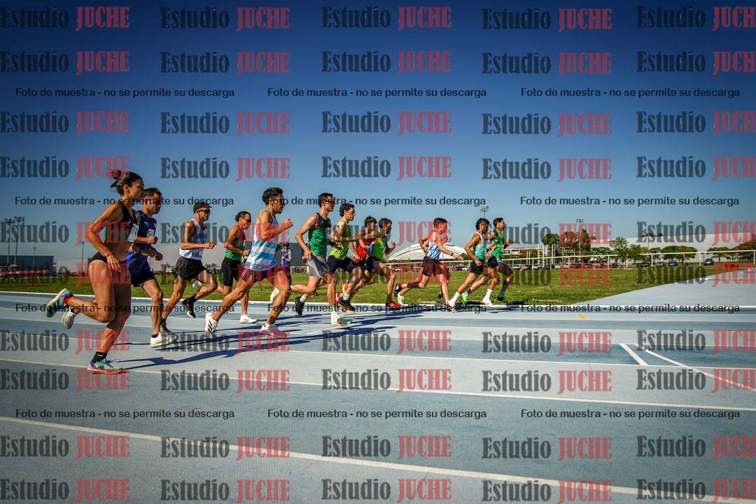 Fotos de los 5000 m de mujeres y varones - serie 1