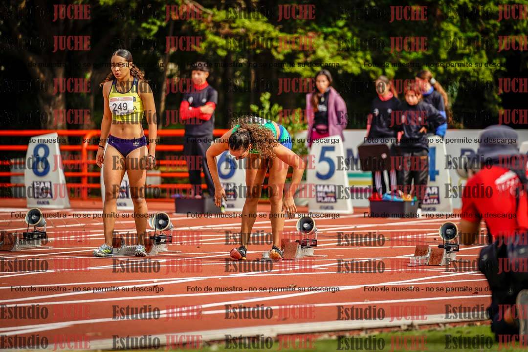 Fotos de los 100 m con vallas de mujeres