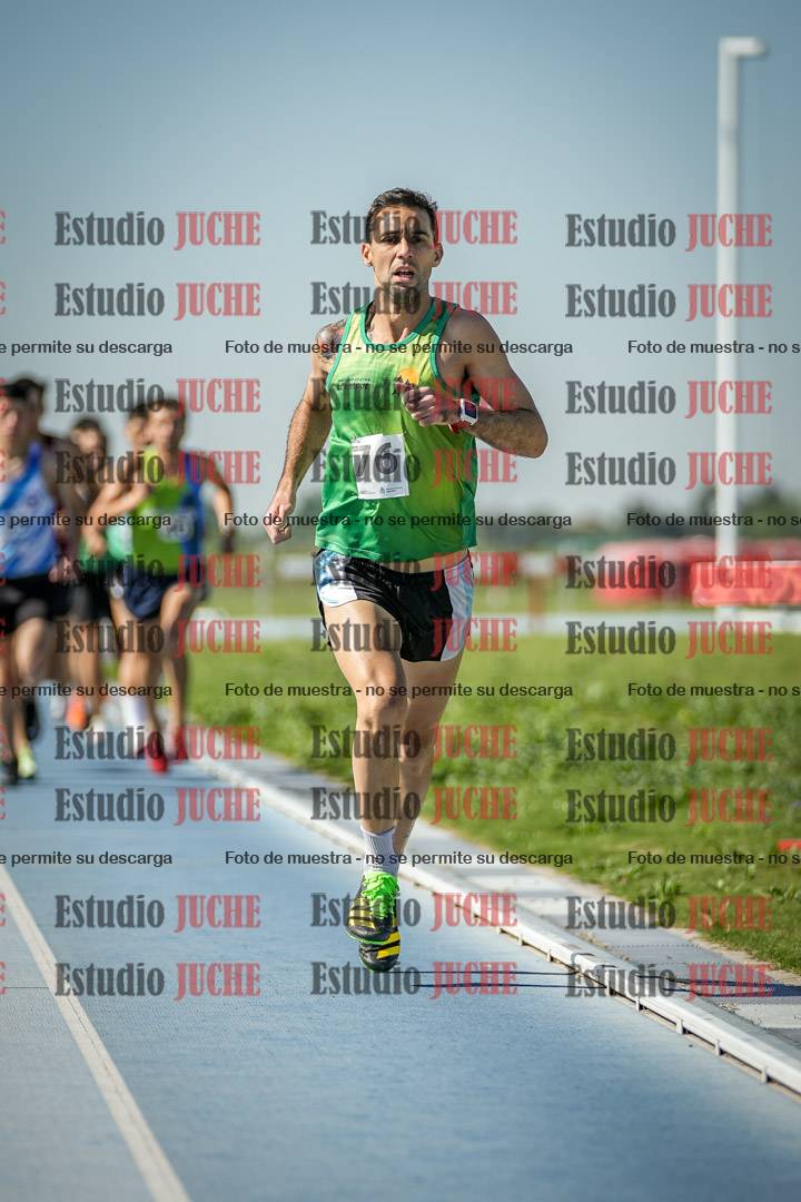 Fotos de los 5000 m de mujeres y varones - serie 1