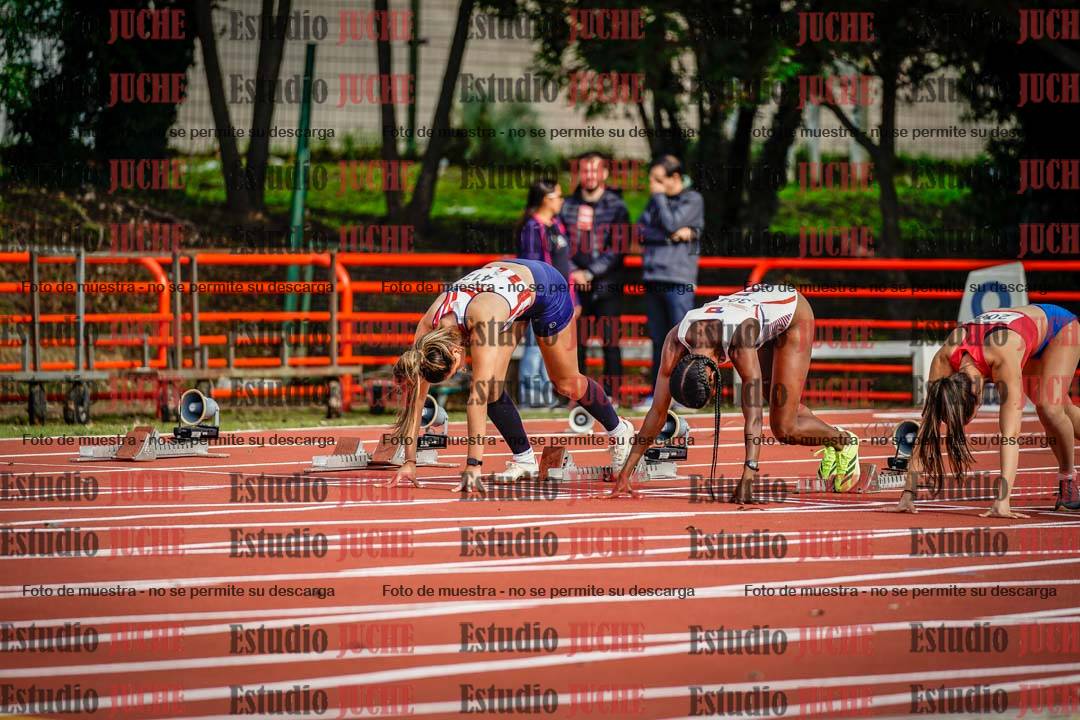 Fotos de los 100 m con vallas de mujeres