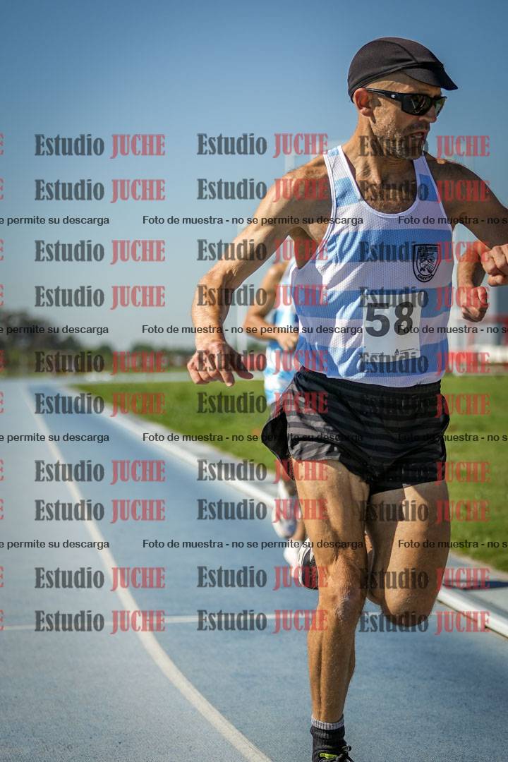 Fotos de los 5000 m de mujeres y varones - serie 1