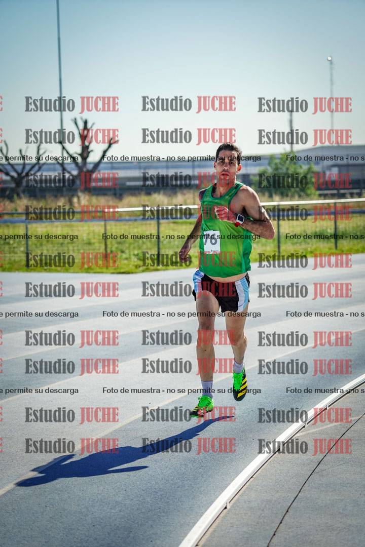 Fotos de los 5000 m de mujeres y varones - serie 1