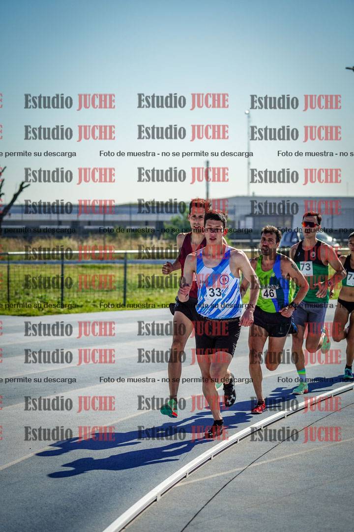Fotos de los 5000 m de mujeres y varones - serie 1