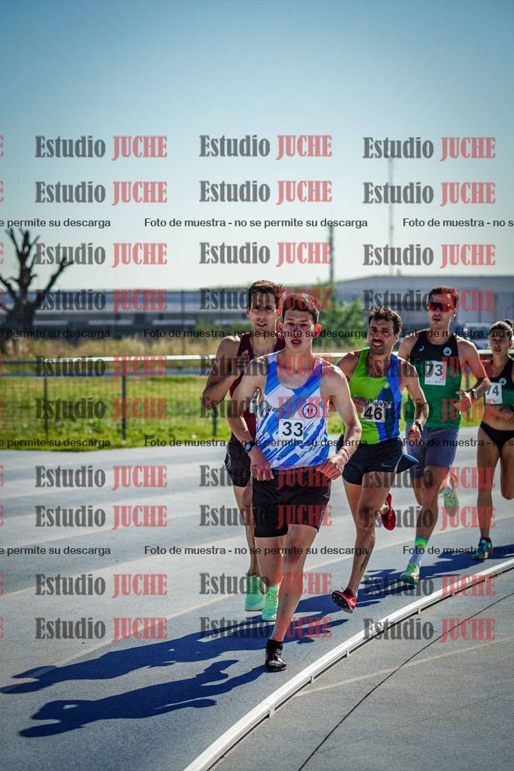 Fotos de los 5000 m de mujeres y varones - serie 1