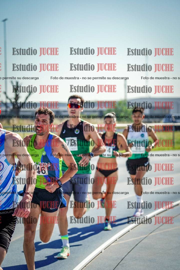 Fotos de los 5000 m de mujeres y varones - serie 1
