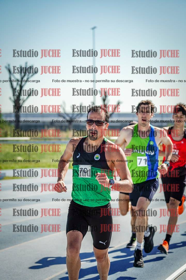 Fotos de los 5000 m de mujeres y varones - serie 1