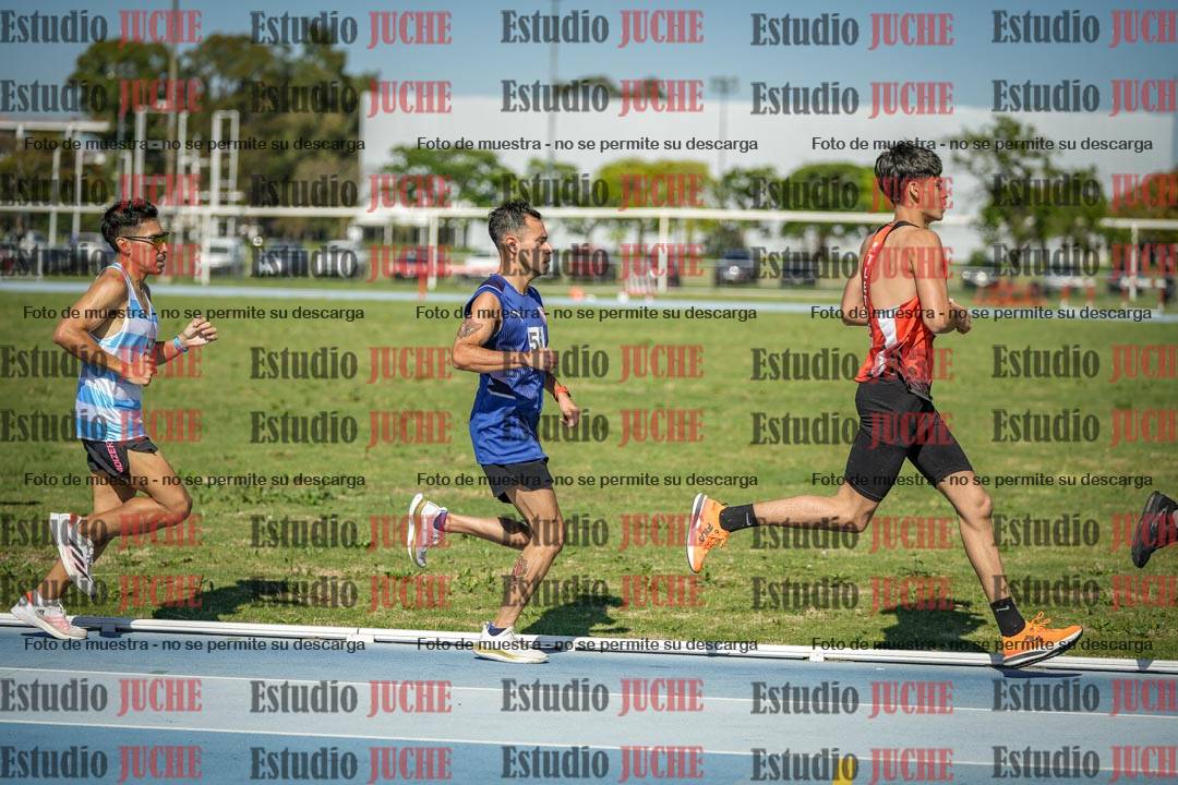 Fotos de los 5000 m de mujeres y varones - serie 1
