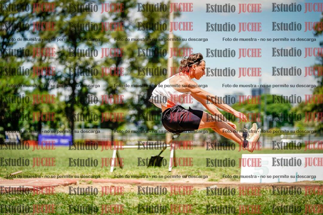 Fotos del salto en largo de varones