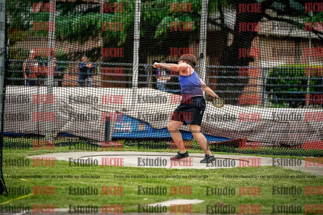 Fotos del lanzamiento de disco de mujeres y varones - U14