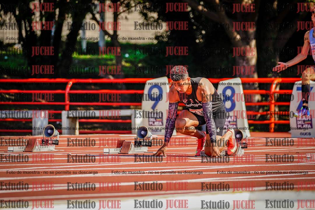 Fotos de los 100 m llanos de varones - deca 1