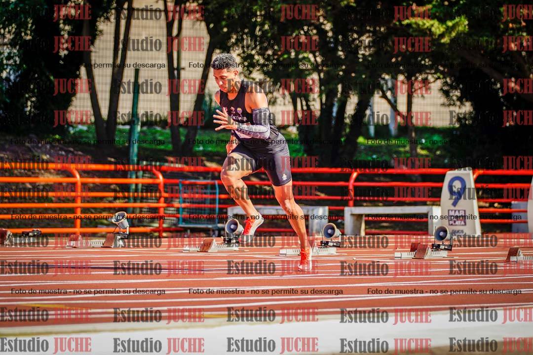 Fotos de los 100 m llanos de varones - deca 1