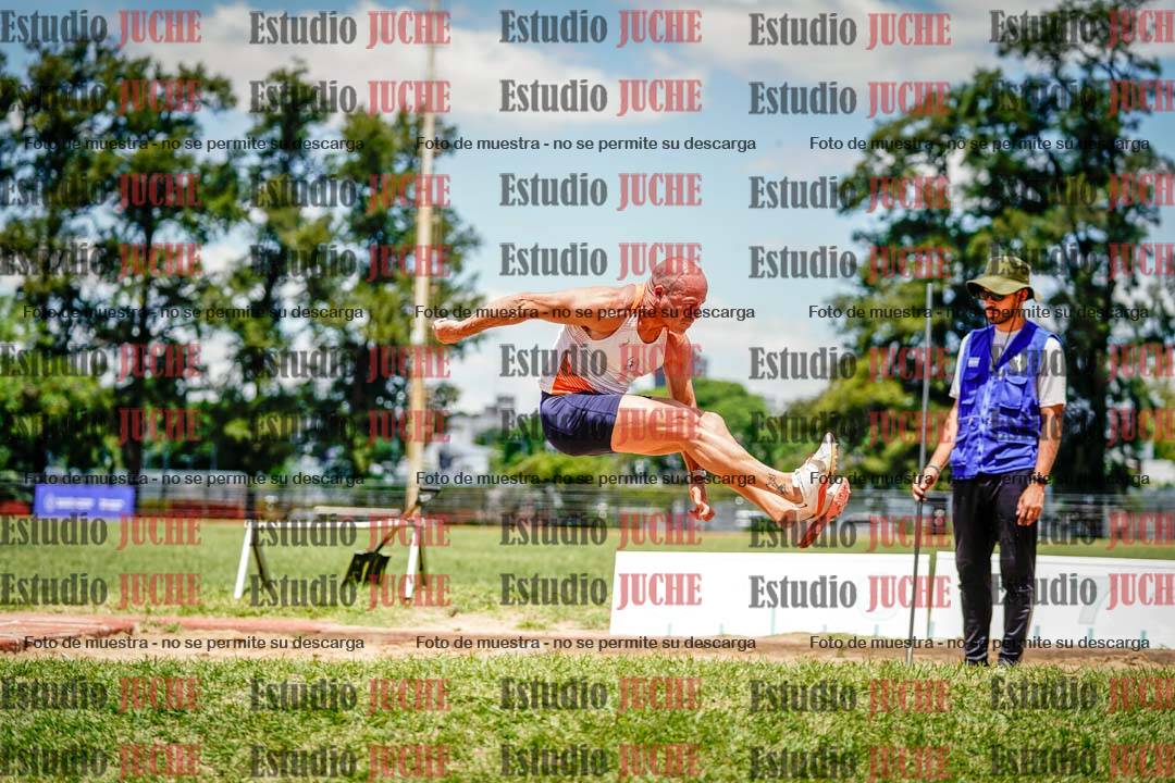 Fotos del salto en largo de varones