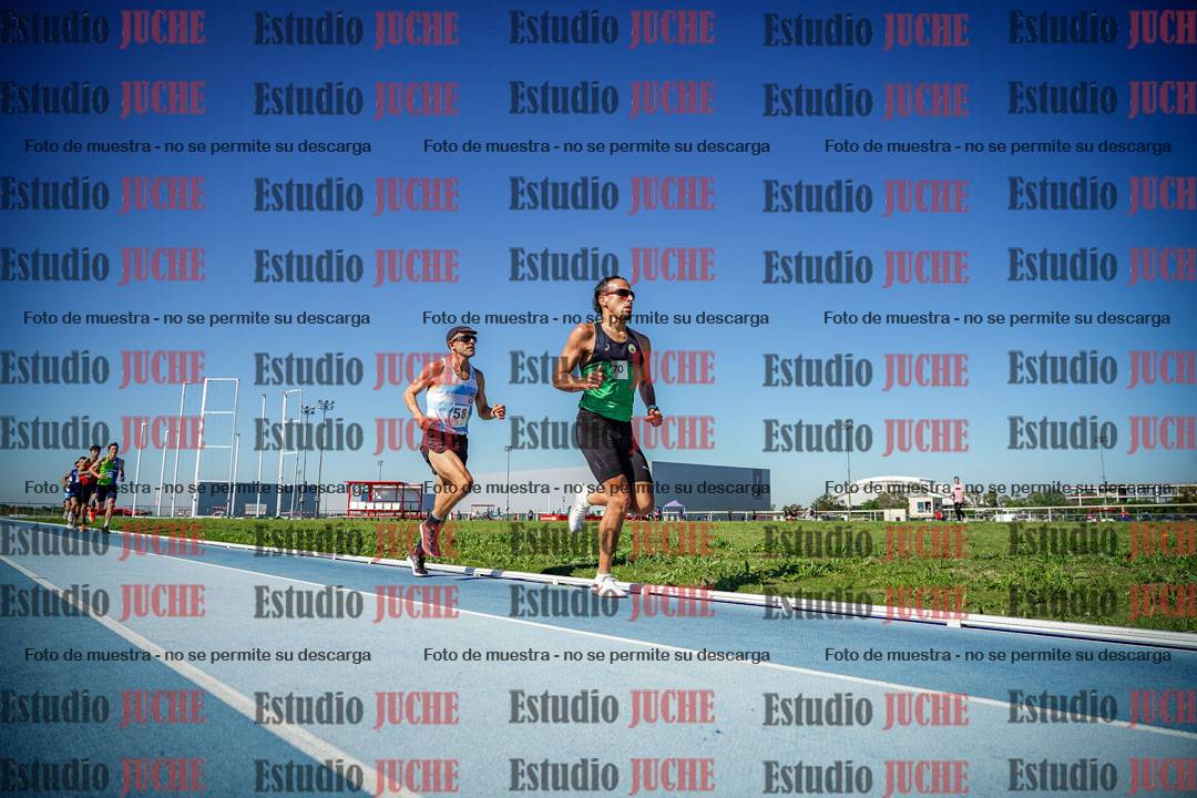 Fotos de los 5000 m de mujeres y varones - serie 1