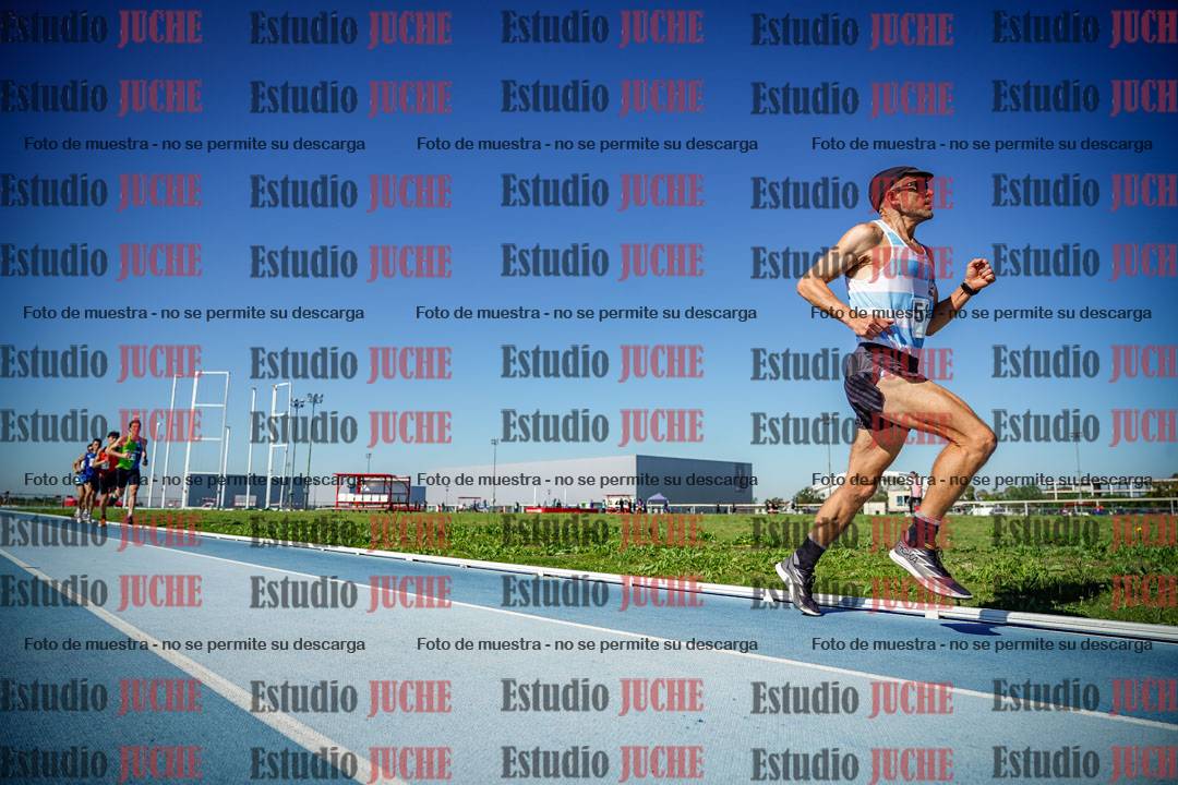 Fotos de los 5000 m de mujeres y varones - serie 1