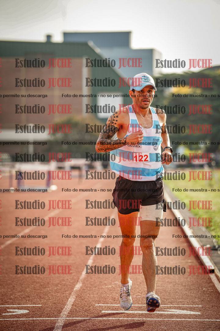 Fotos de los 3000 m con obstáculos de varones