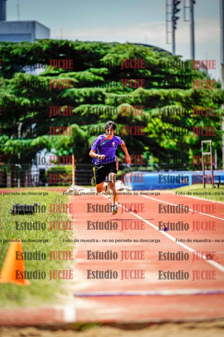 Fotos del salto en largo de varones