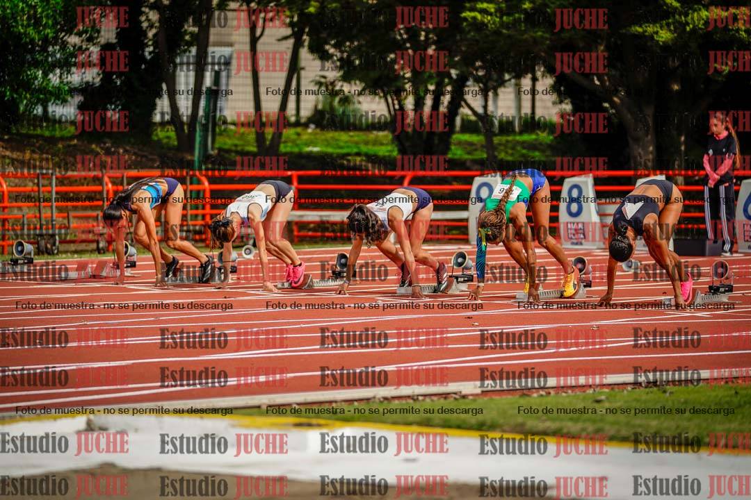 Fotos de los 100 m con vallas de mujeres