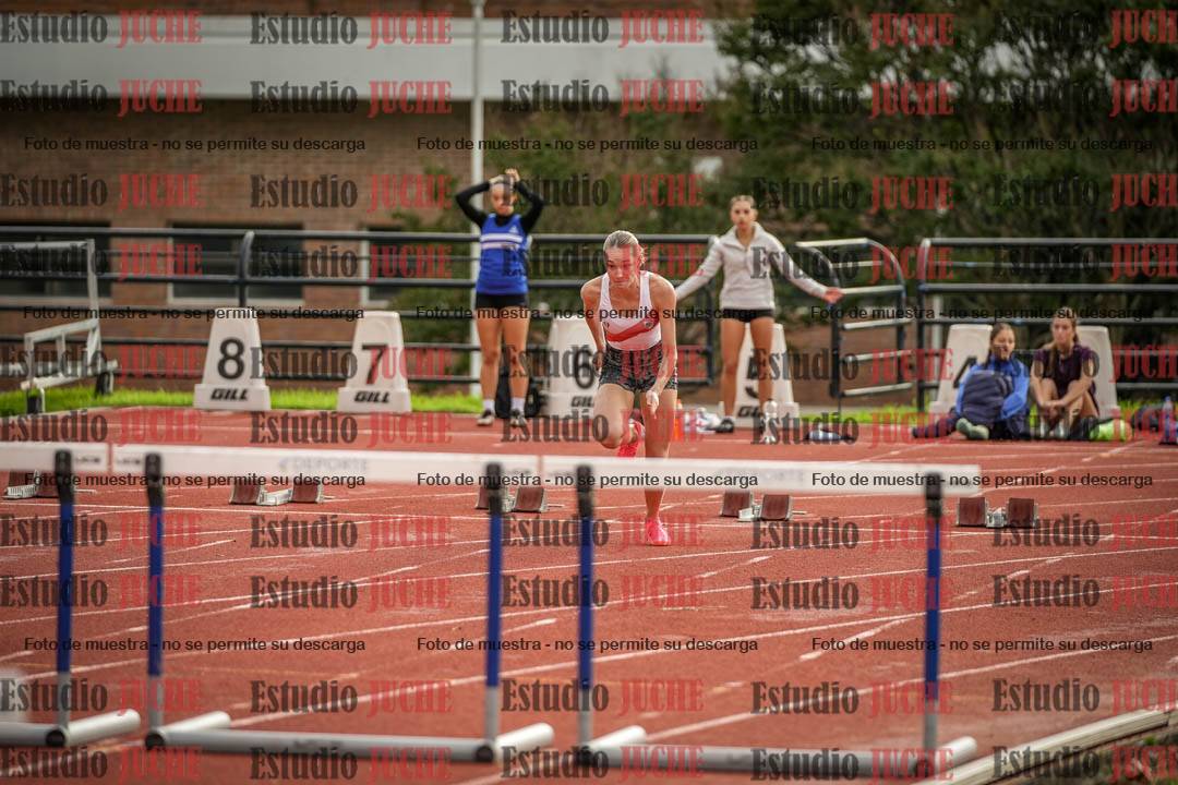 Fotos de los 100 m con vallas de mujeres