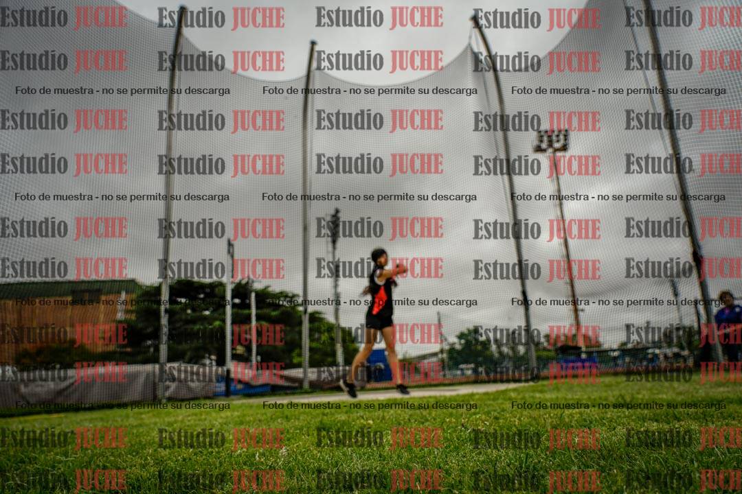 Fotos del lanzamiento de disco de mujeres y varones - U14