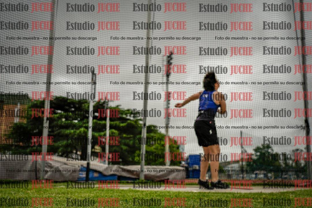 Fotos del lanzamiento de disco de mujeres y varones - U14