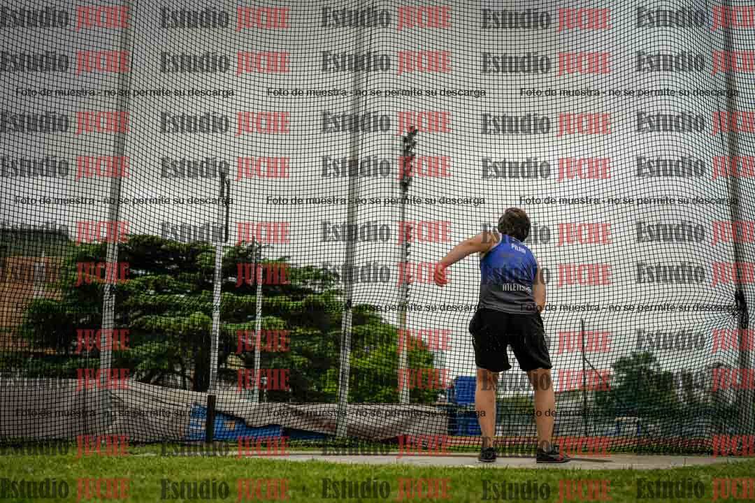 Fotos del lanzamiento de disco de mujeres y varones - U14