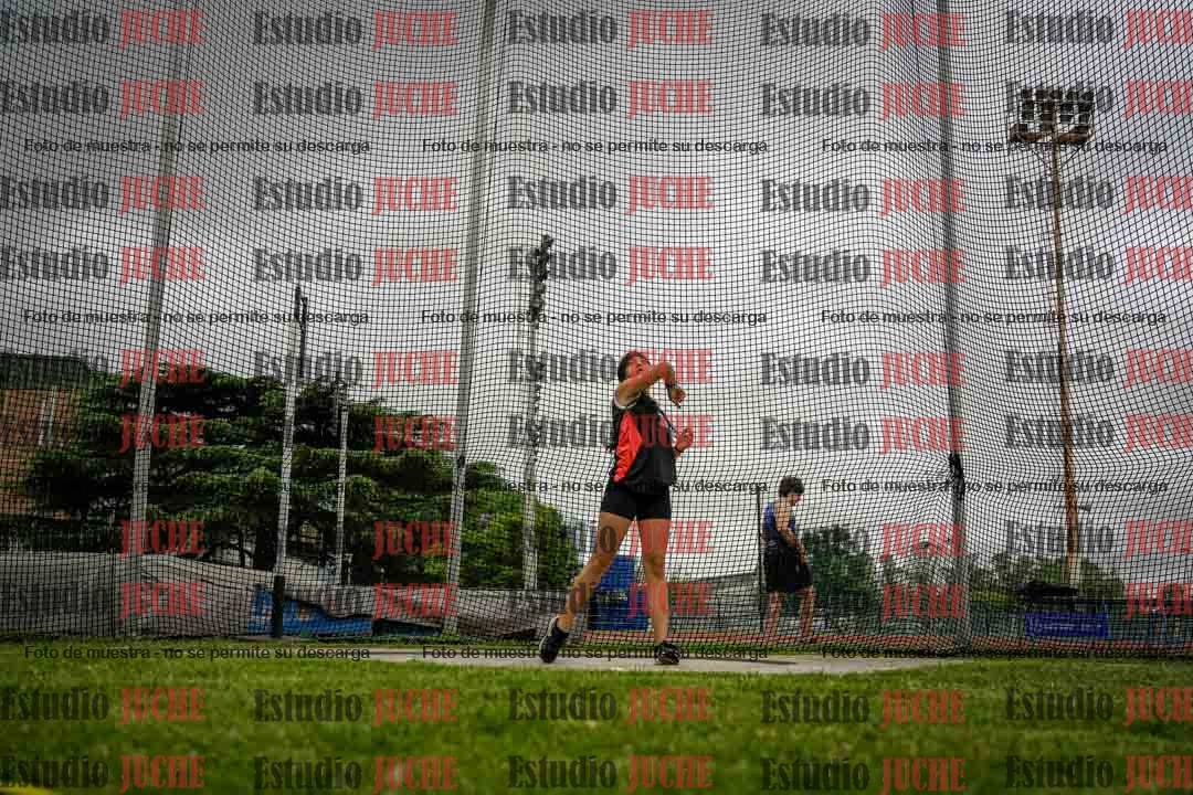 Fotos del lanzamiento de disco de mujeres y varones - U14