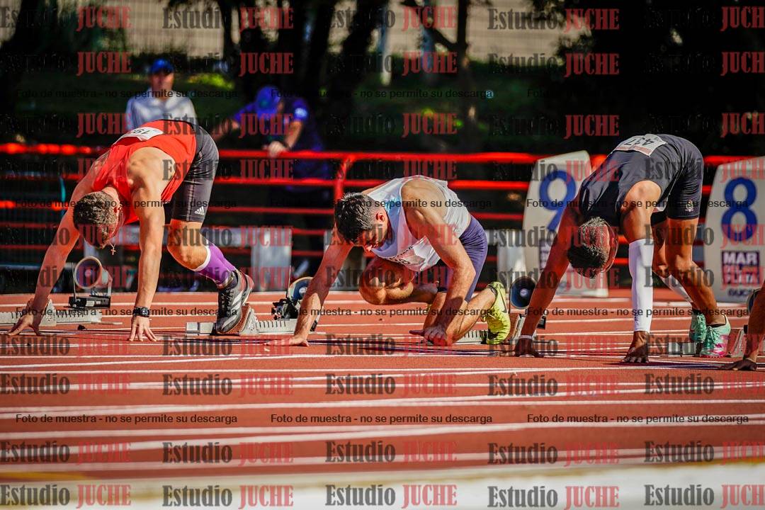 Fotos de los 100 m llanos de varones - deca 1