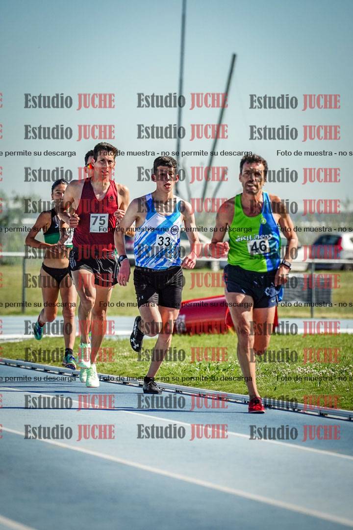 Fotos de los 5000 m de mujeres y varones - serie 1