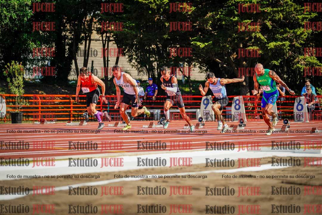 Fotos de los 100 m llanos de varones - deca 1