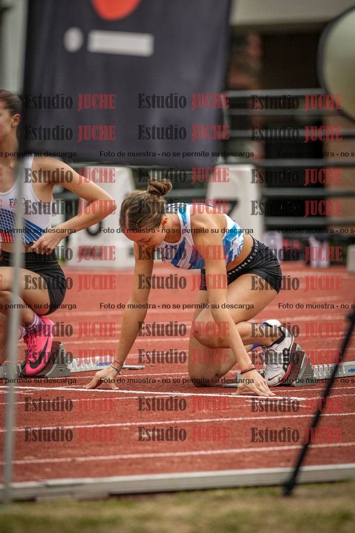 Fotos de los 100 m con vallas de mujeres
