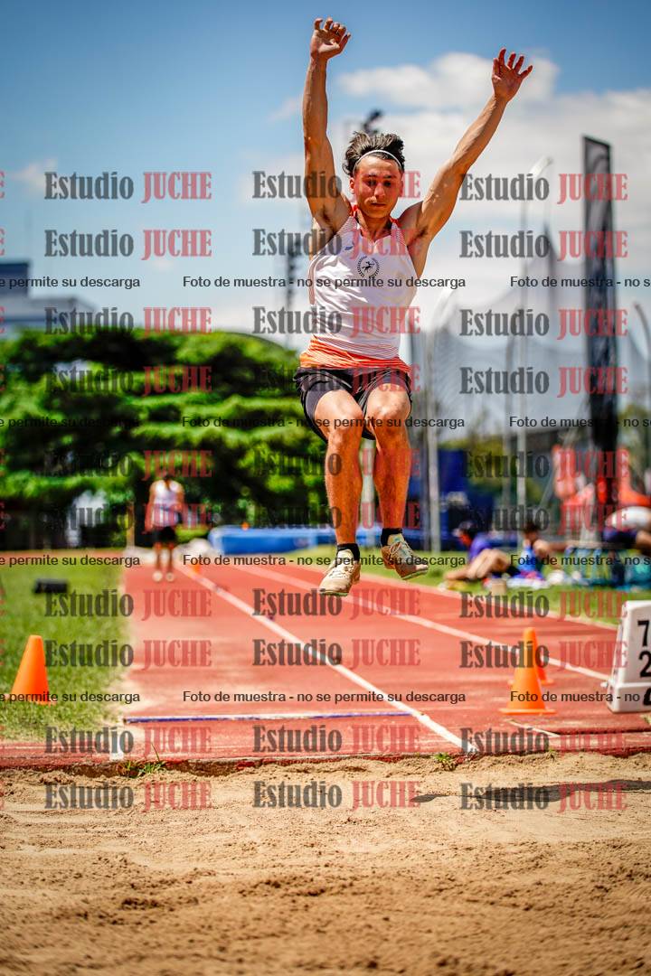 Fotos del salto en largo de varones