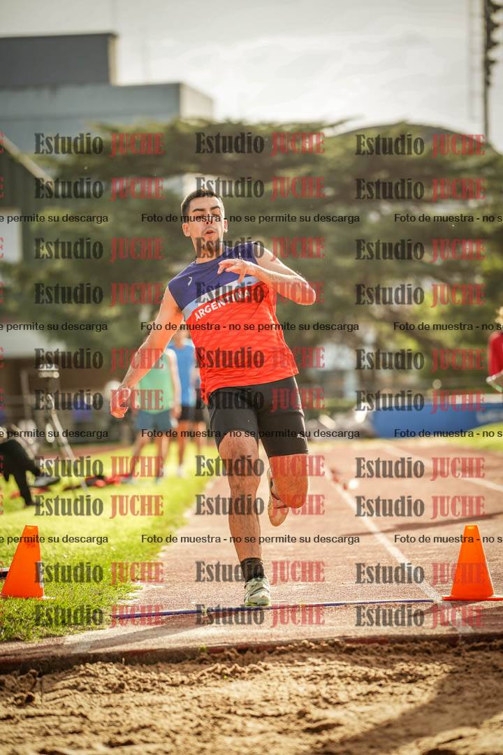 Fotos del salto en largo de varones