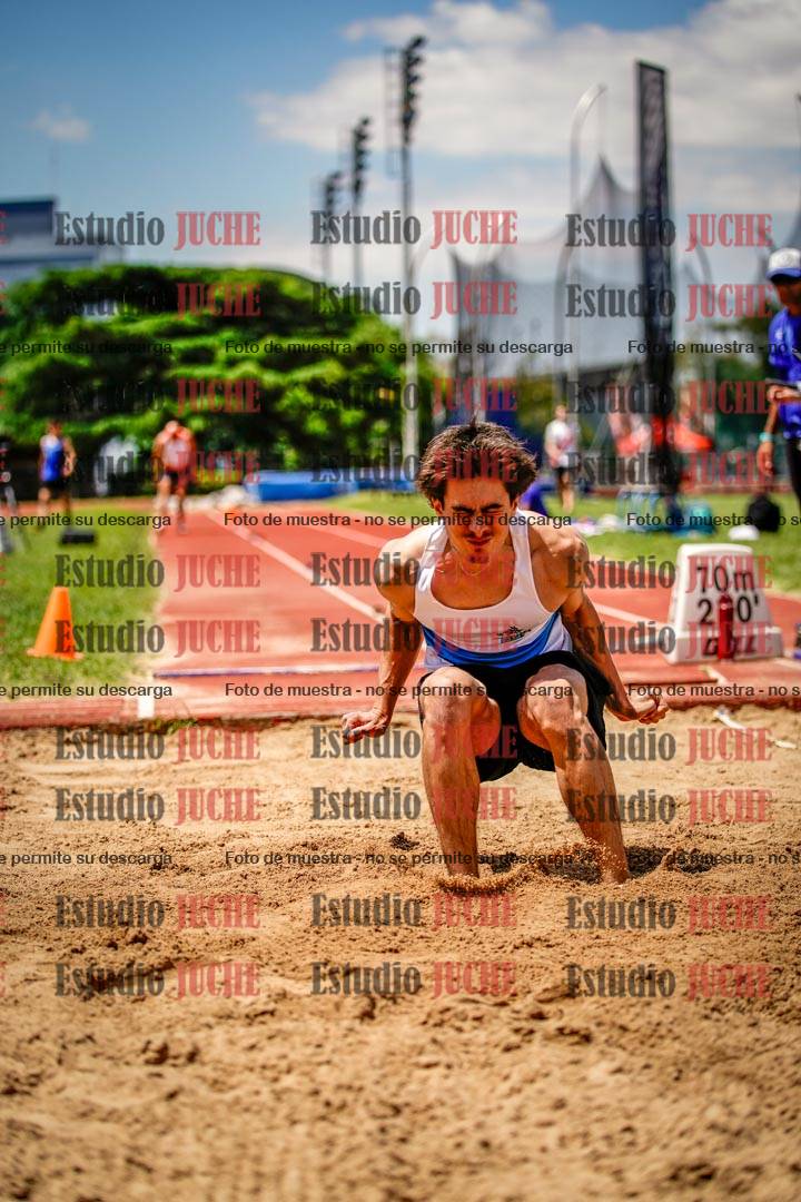 Fotos del salto en largo de varones