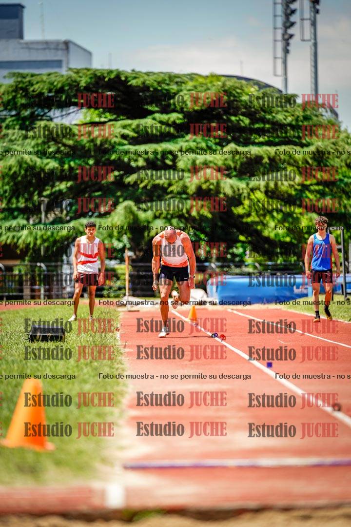 Fotos del salto en largo de varones