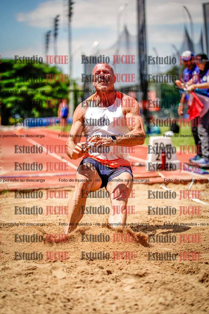Fotos del salto en largo de varones