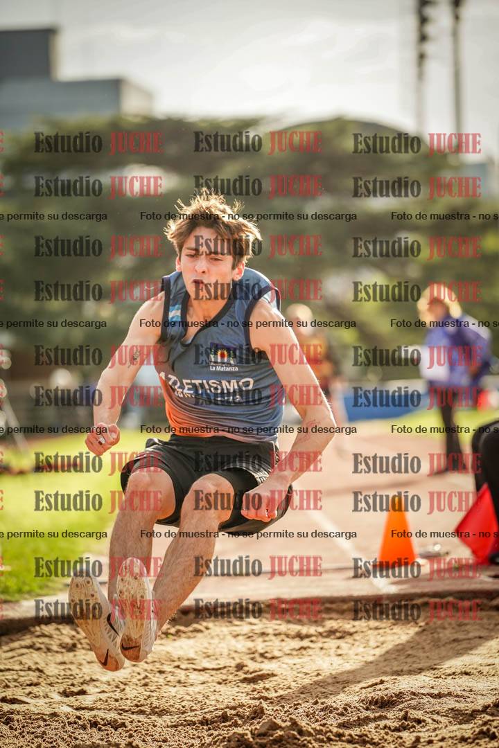 Fotos del salto en largo de varones