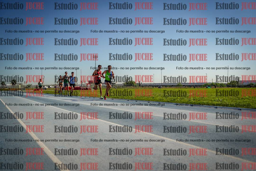 Fotos de los 5000 m de mujeres y varones - serie 1