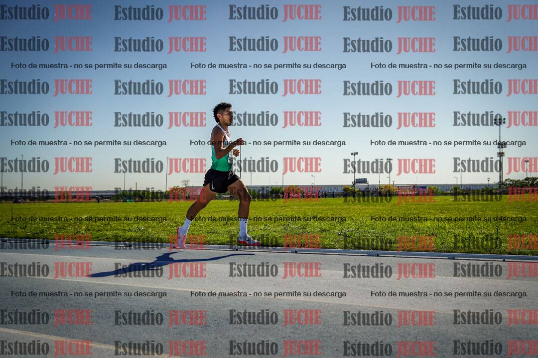 Fotos de los 5000 m de mujeres y varones - serie 1
