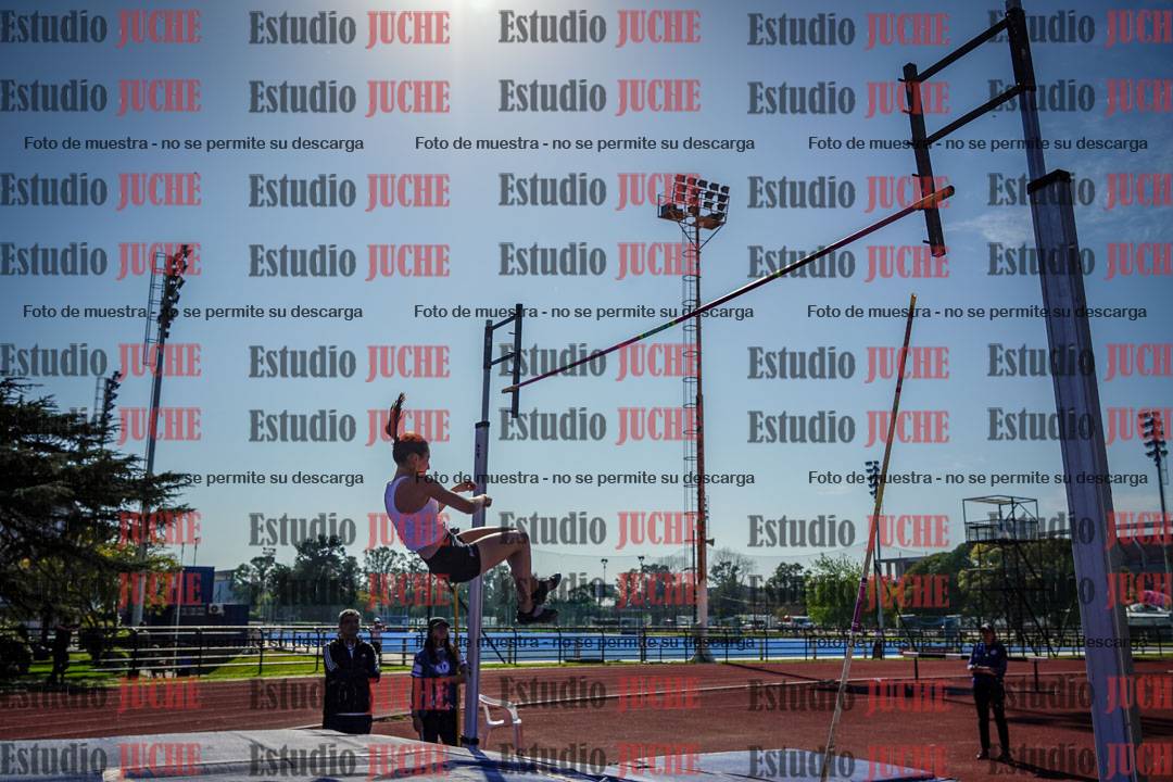 Fotos del salto con garrocha de mujeres y varones