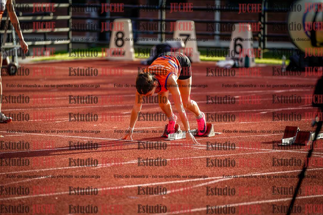 Fotos de los 100 m con vallas de mujeres