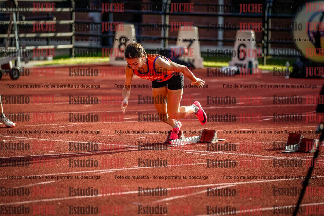 Fotos de los 100 m con vallas de mujeres