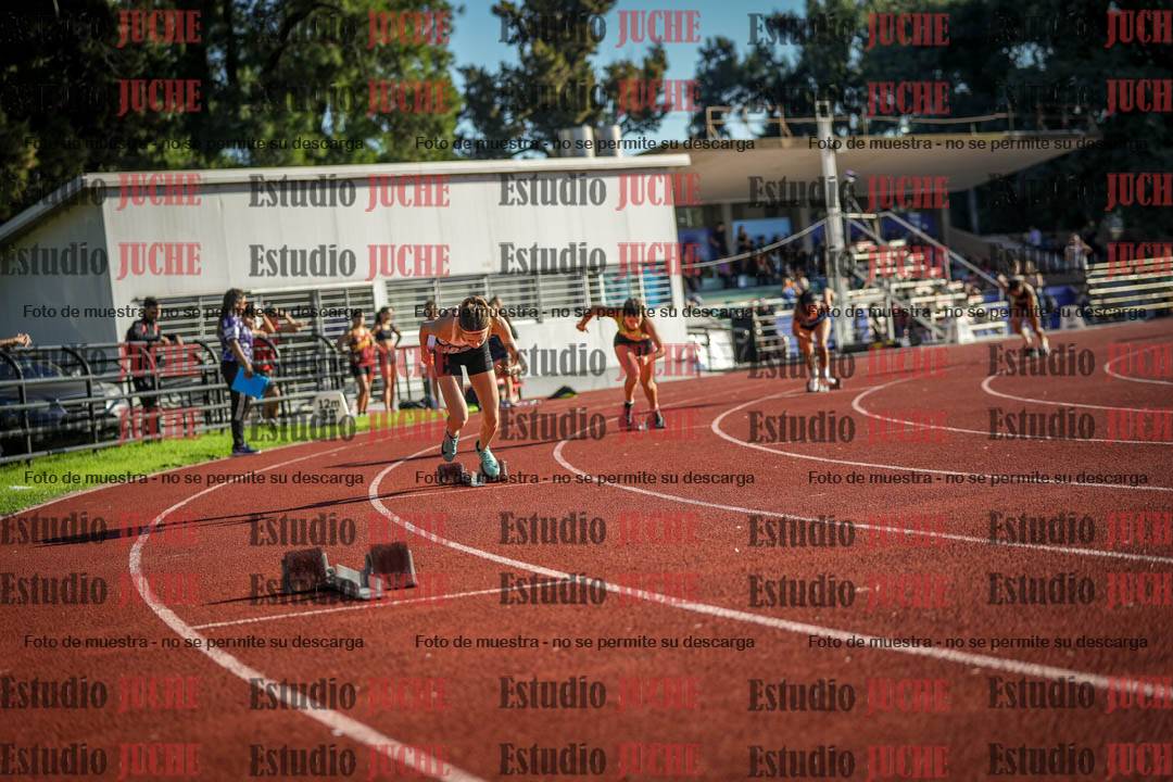 Fotos de los 400 m con vallas de mujeres