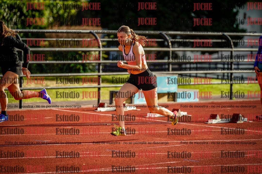 Fotos de los 100 m con vallas de mujeres