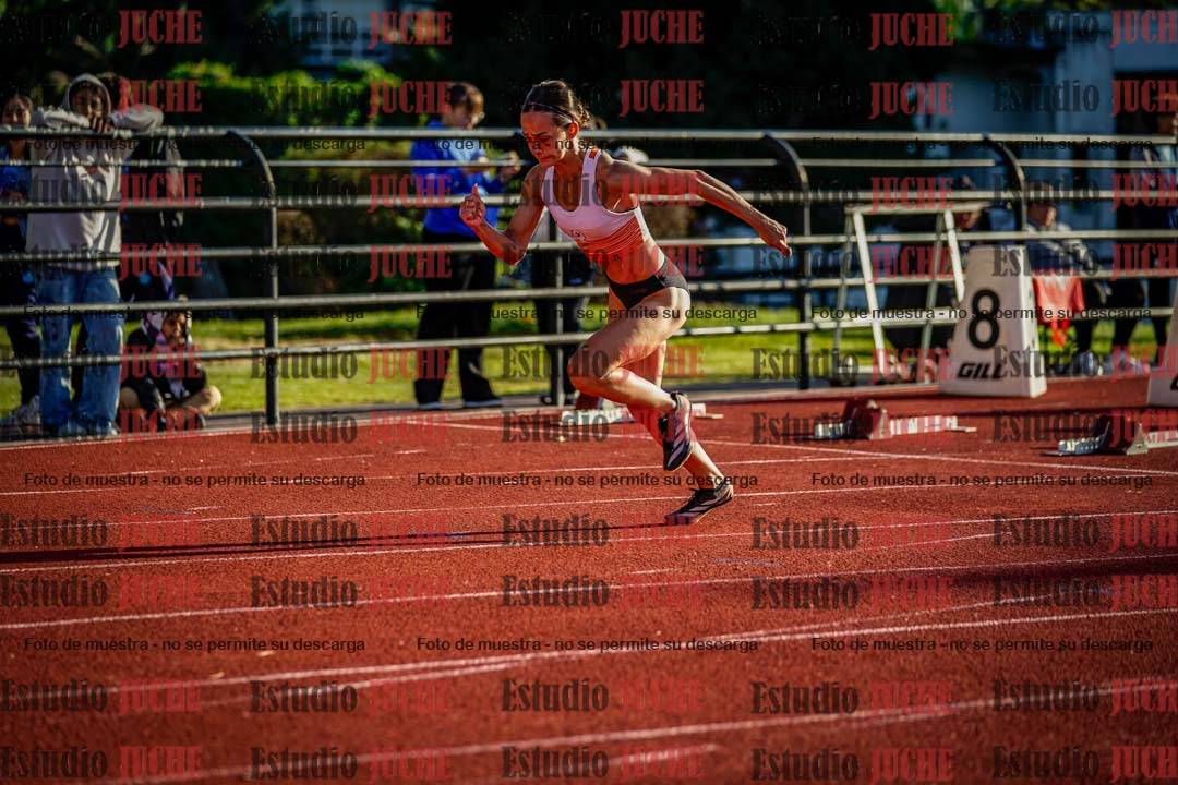 Fotos de los 100 m con vallas de mujeres