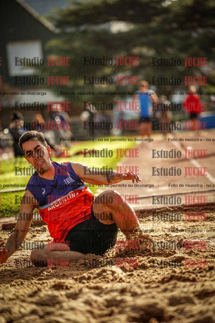 Fotos del salto en largo de varones