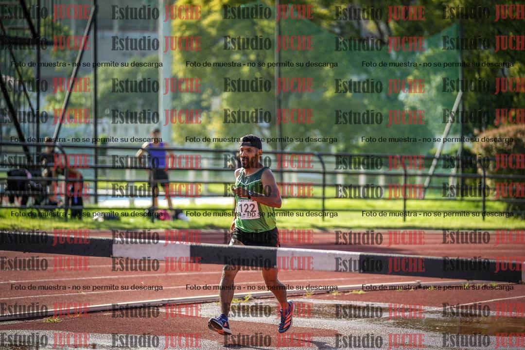 Fotos de los 3000 m con obstáculos de varones