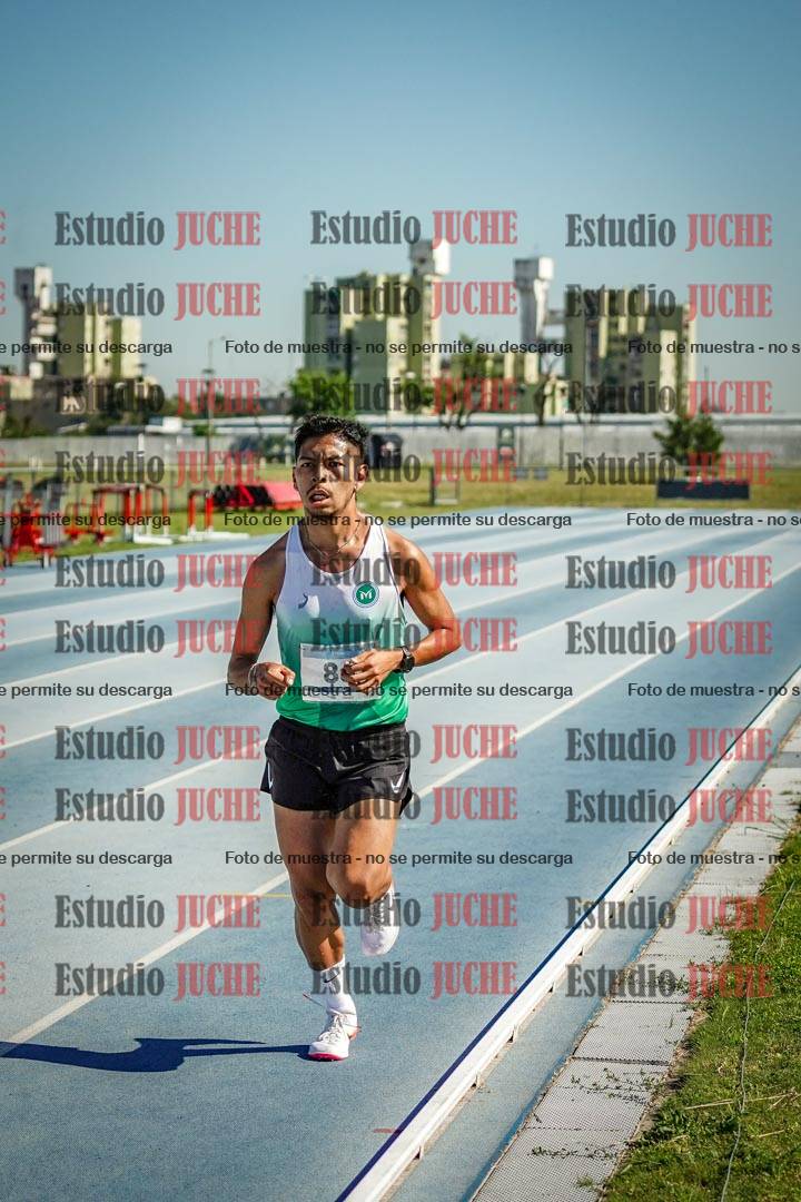 Fotos de los 5000 m de mujeres y varones - serie 1