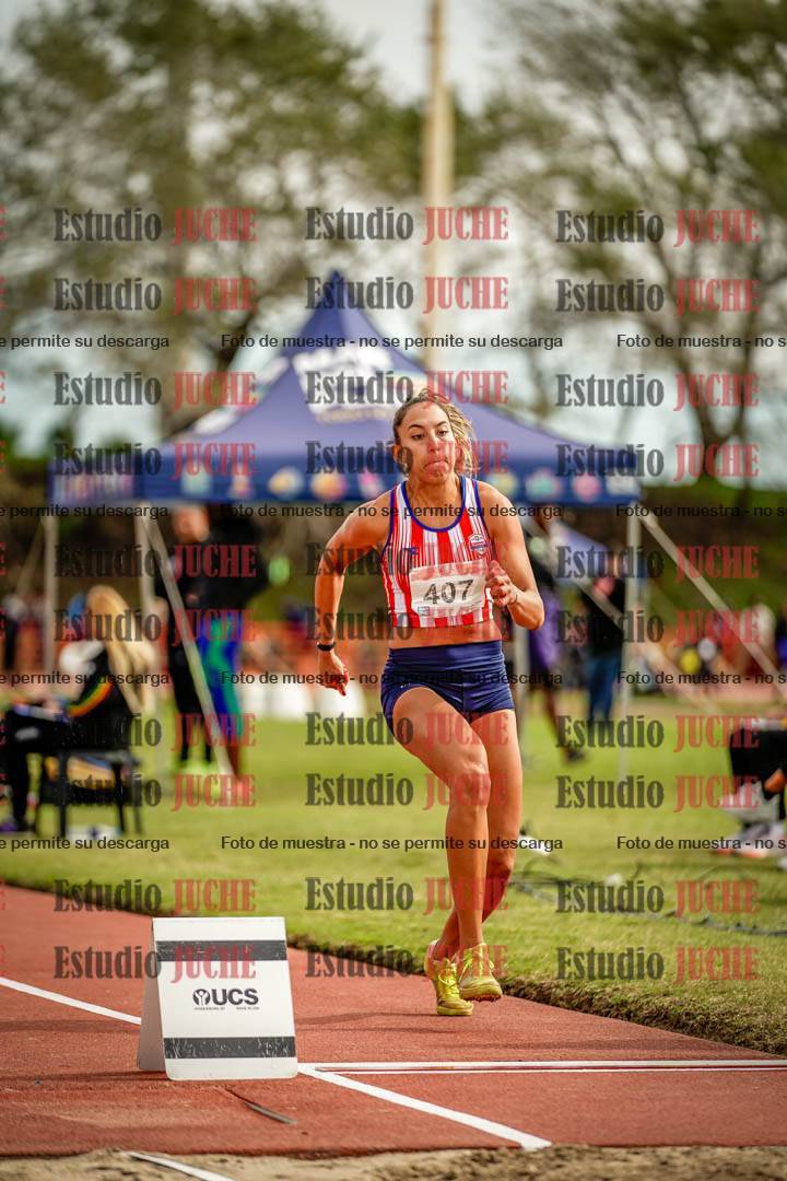 Fotos del salto en largo de mujeres - hepta 5