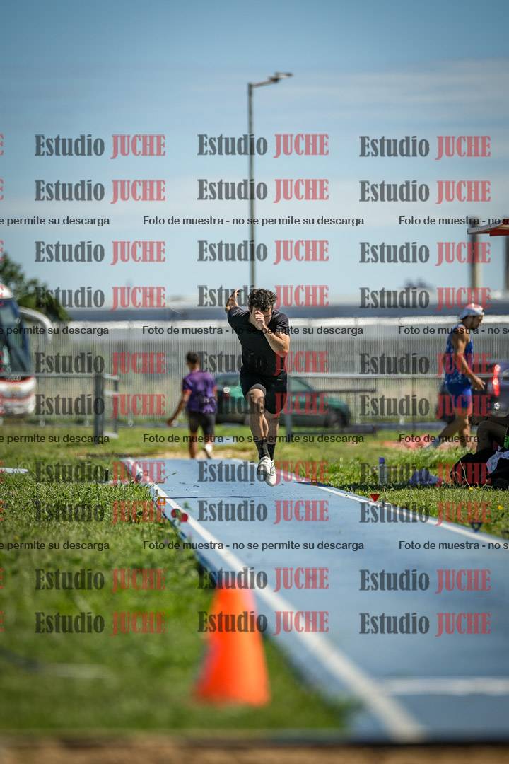 Fotos del salto en largo de varones